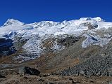 12 02 Naulech And Mera Peak From Above Kongme Dingma The trail continues climbing with excellent views of Naulekh (6363m), Mera Peak Central Summit (6461m), the rock sheltering Mera High Camp (5770m), and Mera Peak North Summit (6476m).